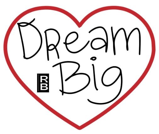 The phrase "dream big" inside a heart.