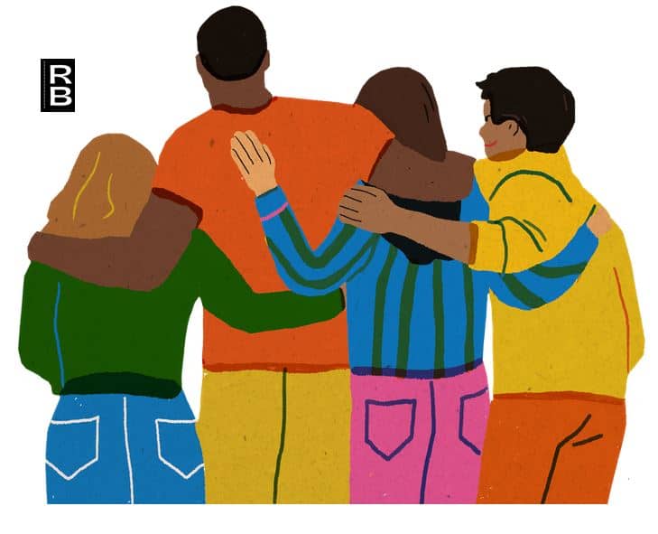 Four friends hugging each other.