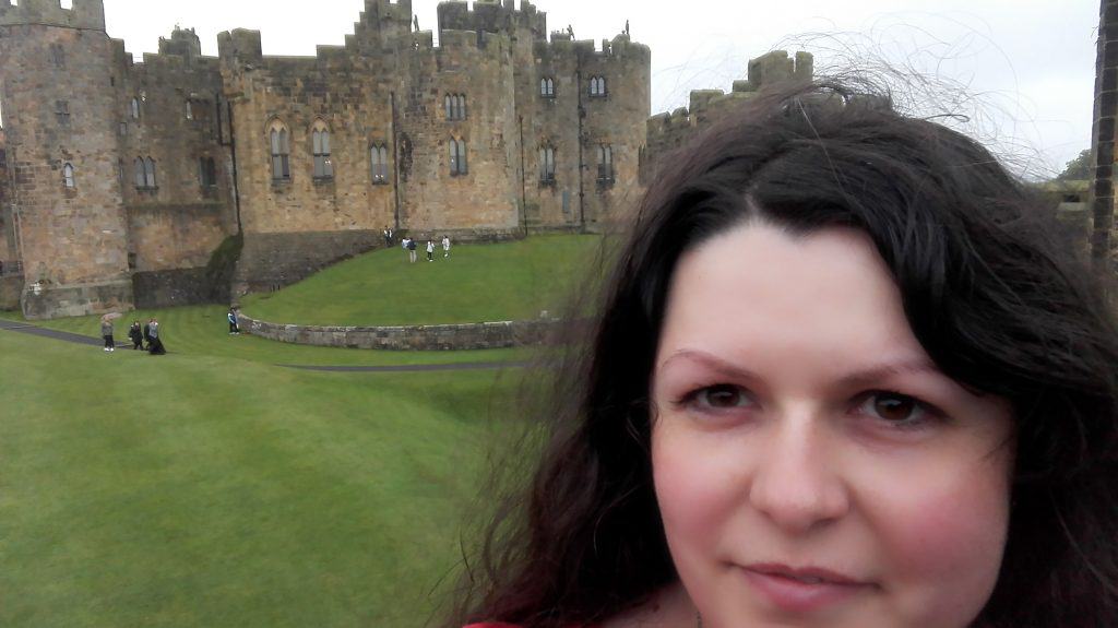 Rebeca Duriga with a castle behind her.
