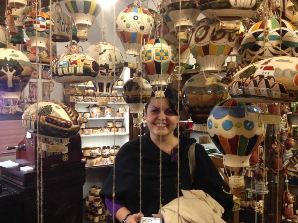 Rebeca Duriga smiling while surrounded by balloons.