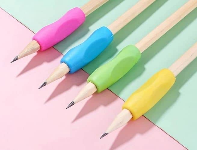 Four colored pencil grips.