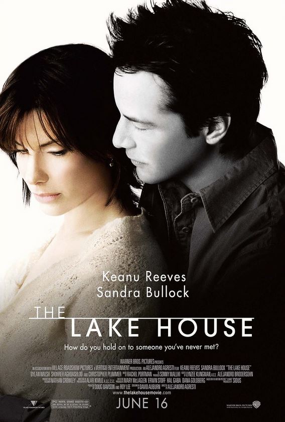 Poster of the movie "The Lake House", with Keanu Reeves looking over the shoulder of Sandra Bullock.