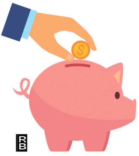 A hand putting one dollar into a piggy bank.
